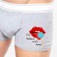 Grey Boxer shorts with a white contrasting waist band. Printed with an image of lips and tongue licking a blue lolly with the words I've licked it so it's mine