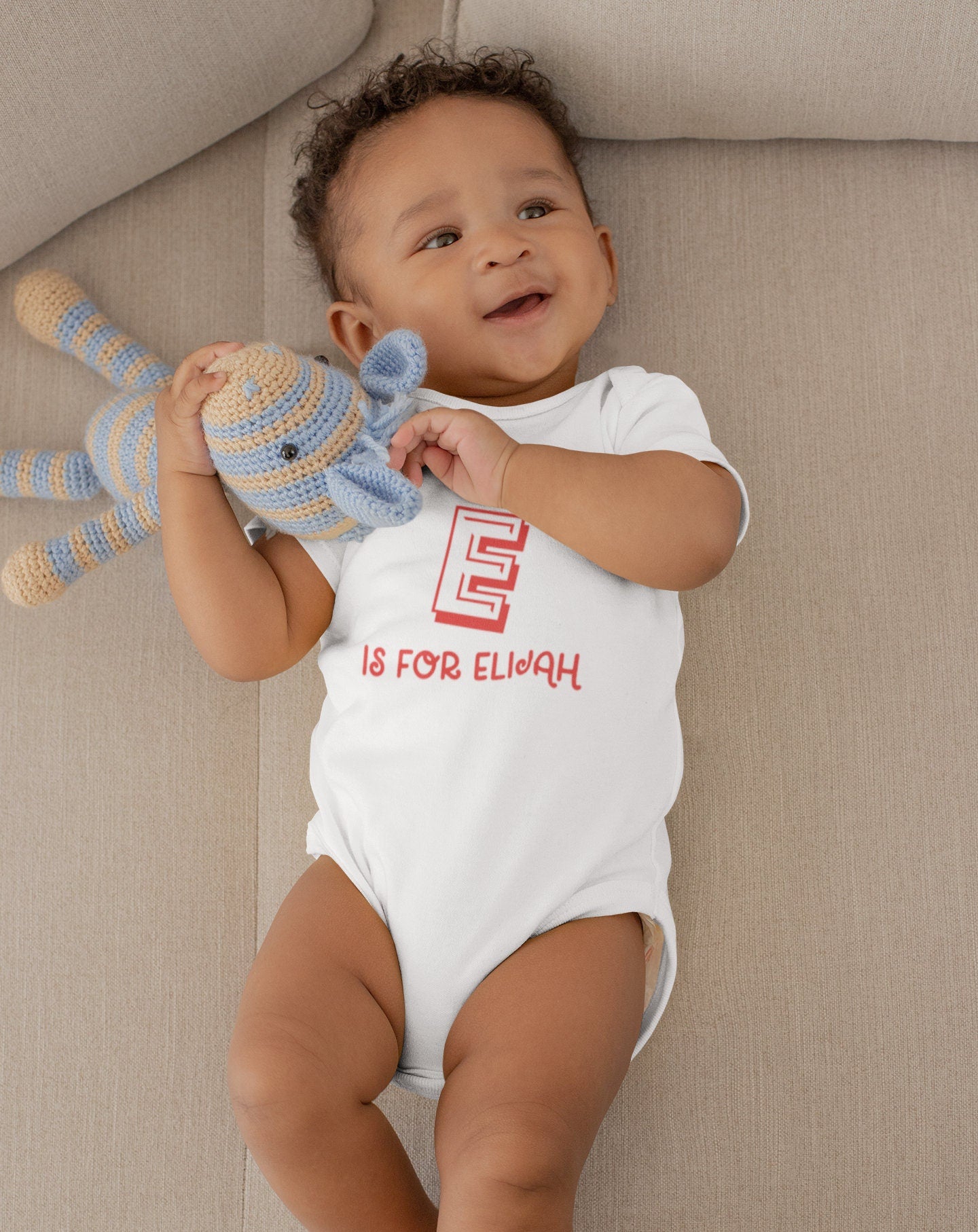 Personalised letter baby grow