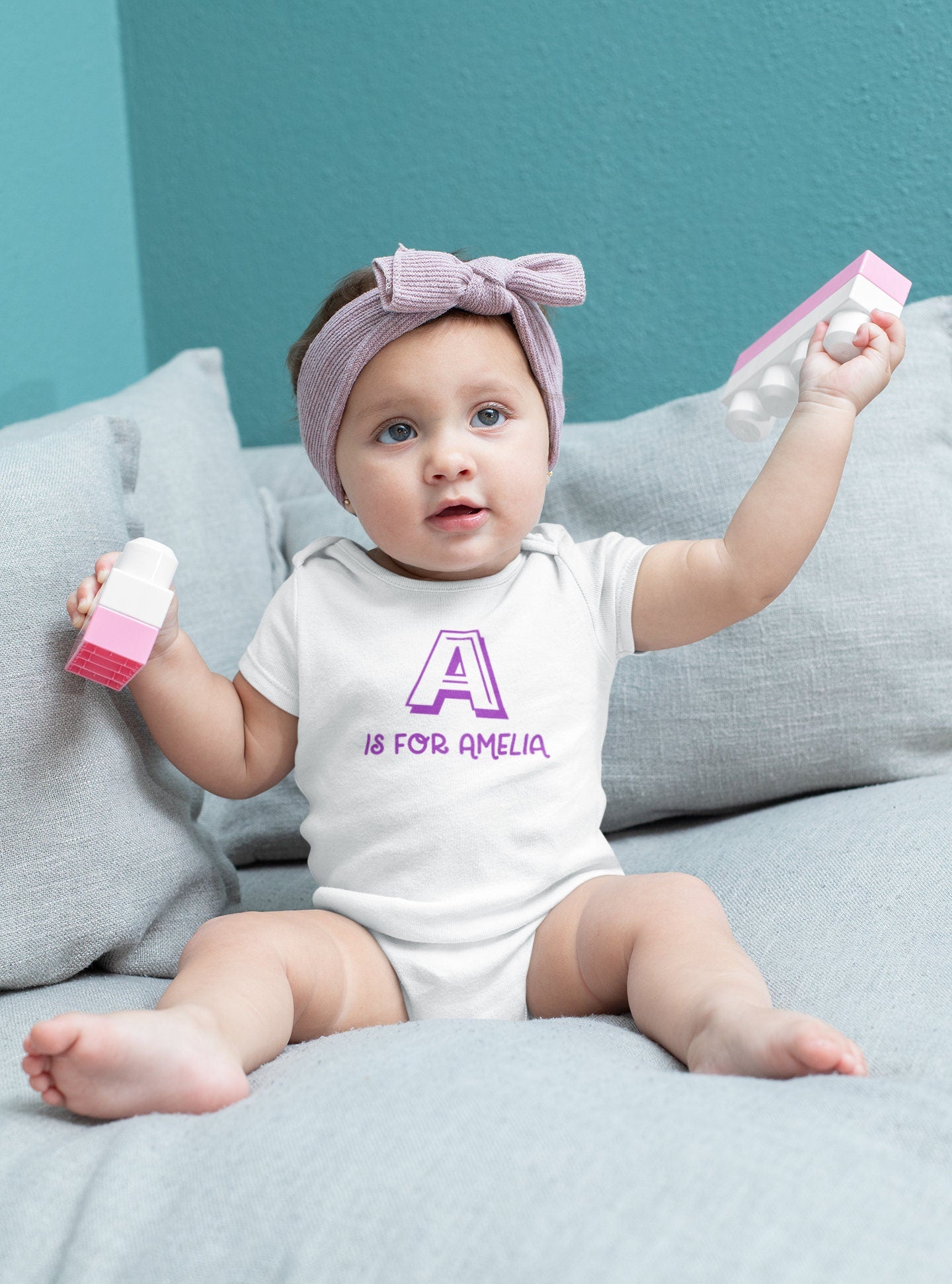 Personalised letter baby grow